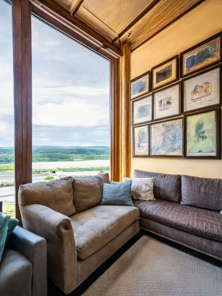 Image A living room with artwork hanged on wall