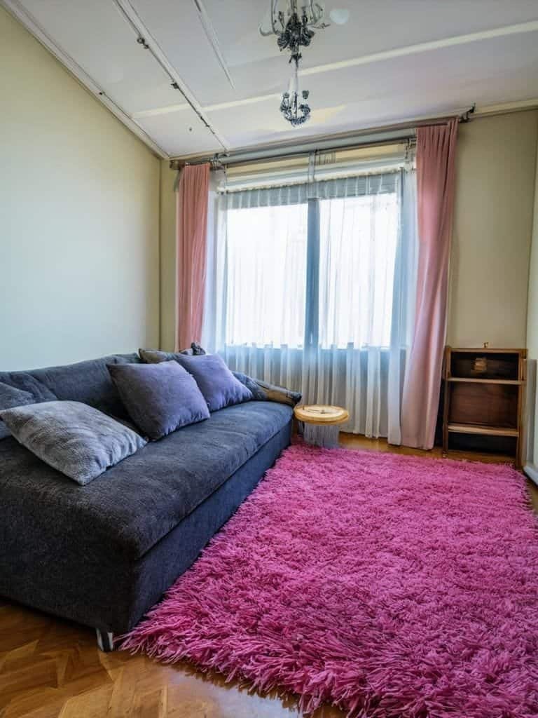 Image A cozy living room with a rug