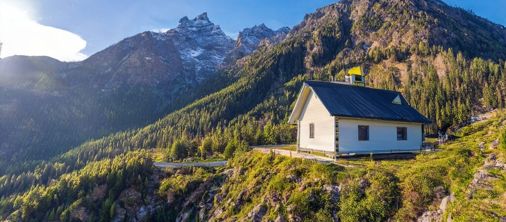 mountain tiny house on a bright mountain top