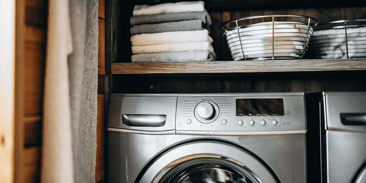 6644cdf2427e41448db91bd9539b77b6 Compact washer dryer combo in tiny house kitchen