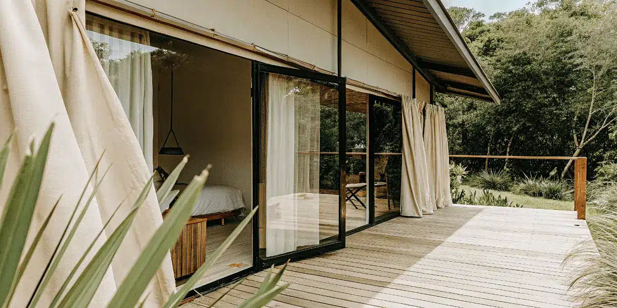 Spacious Amazon Tiny House with large outdoor deck and glass doors