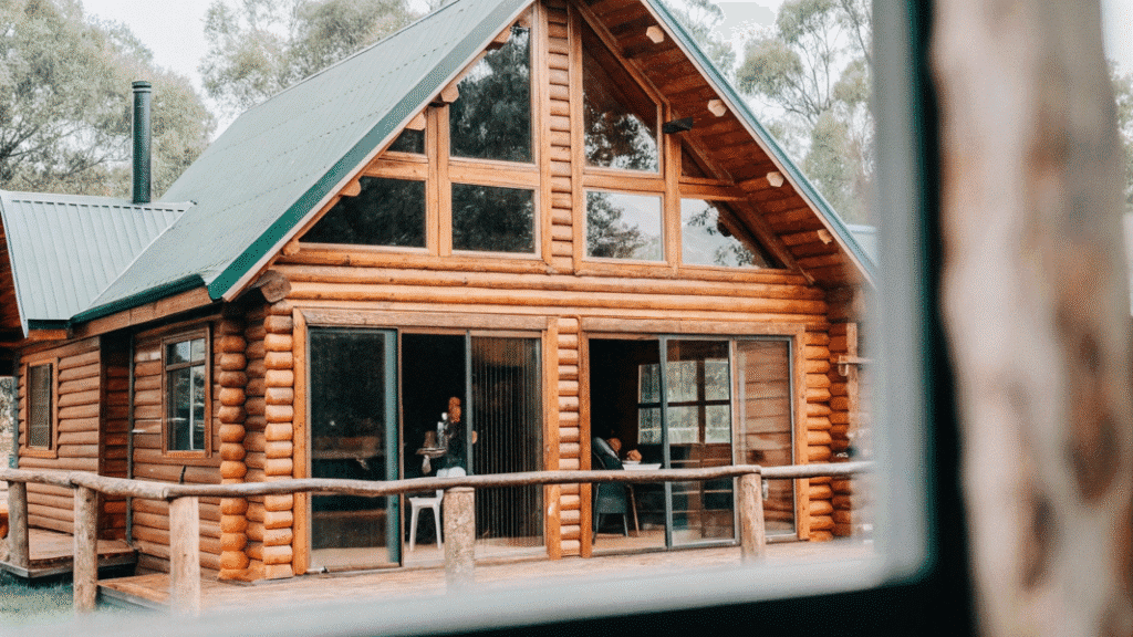 Abeautifullogcabin A photo of a rustic wooden house with a traditional lodge style architecture The house features a combination of wooden beams and a gabled roof with natural materials such as wood