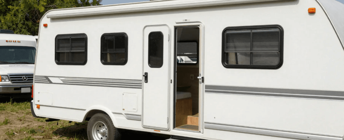 A white RV on a road
