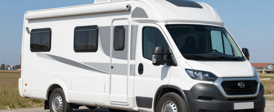 What size rv A small sized white RV on road